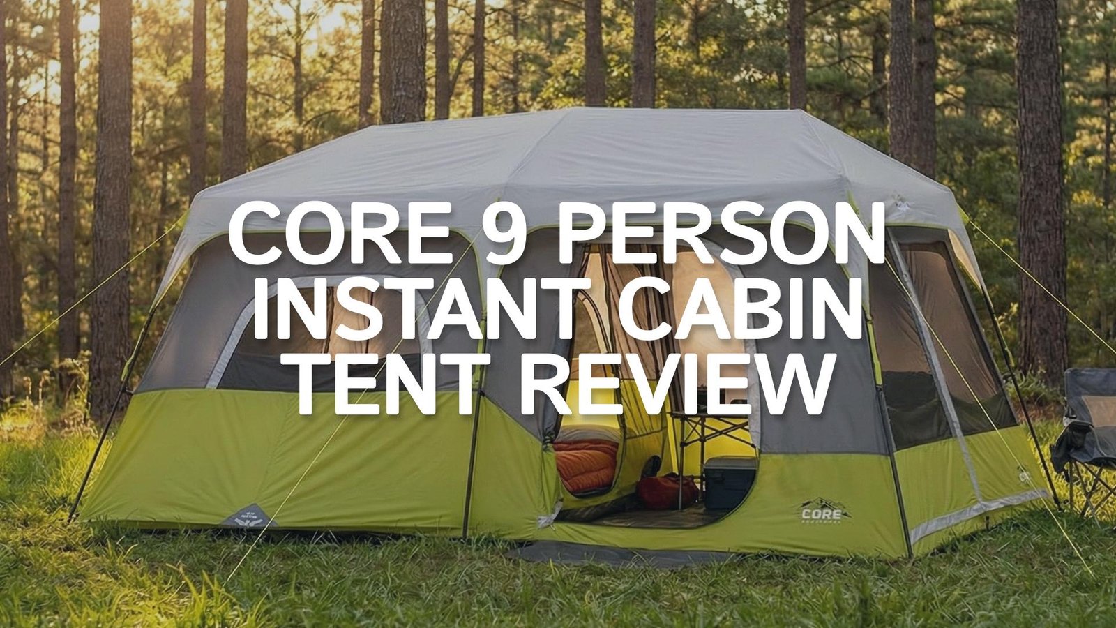 Core 9 Person Instant Cabin Tent set up in a grassy campsite with the large T-door open.