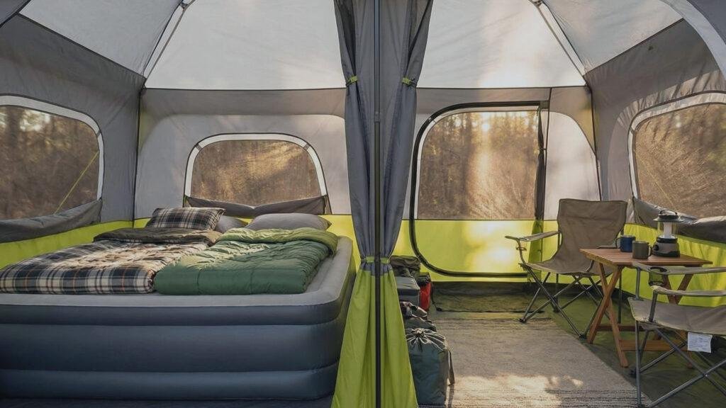 Interior view of Core 9 Person Instant Cabin Tent showing room divider curtain and queen air mattress space.