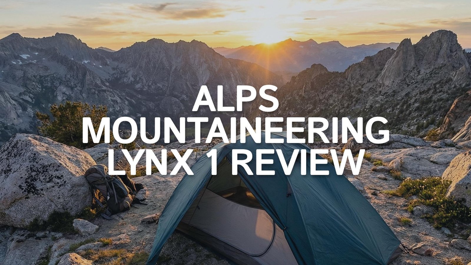 ALPS Mountaineering Lynx 1 tent pitched on a mountain at sunset.