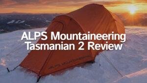 ALPS Mountaineering Tasmanian 2 tent pitched on snow during a winter sunset.