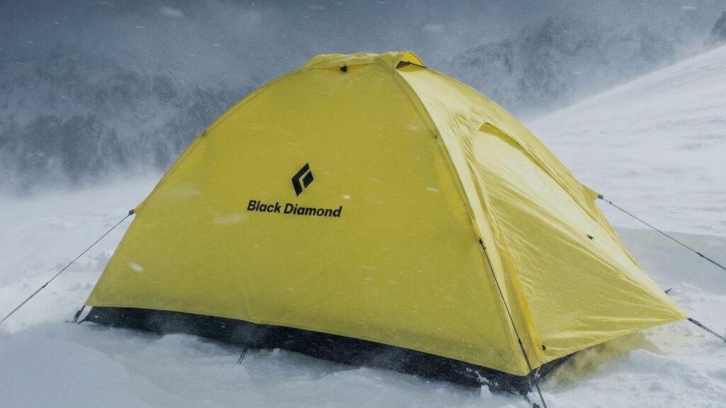Black Diamond Eldorado tent standing firm in a heavy snowstorm.
