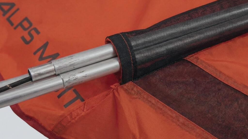 Close up of aluminum poles sliding into continuous sleeves on the Tasmanian 2.