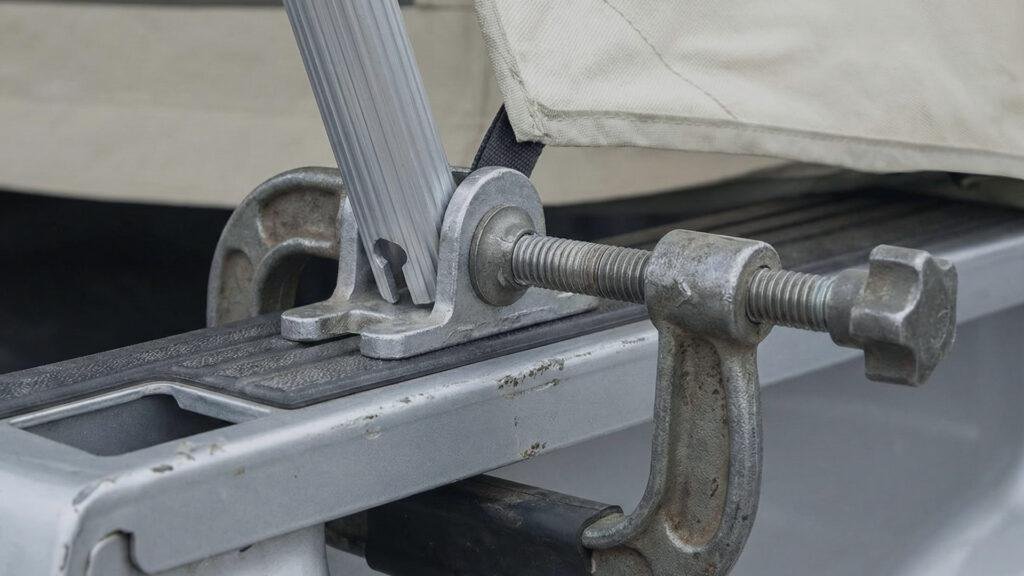 Close up of the heavy-duty C-clamp rail system used on the Kodiak Truck Tent.
