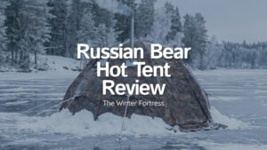 Russian Bear Hot Tent pitched on a frozen lake with a wood stove burning inside.