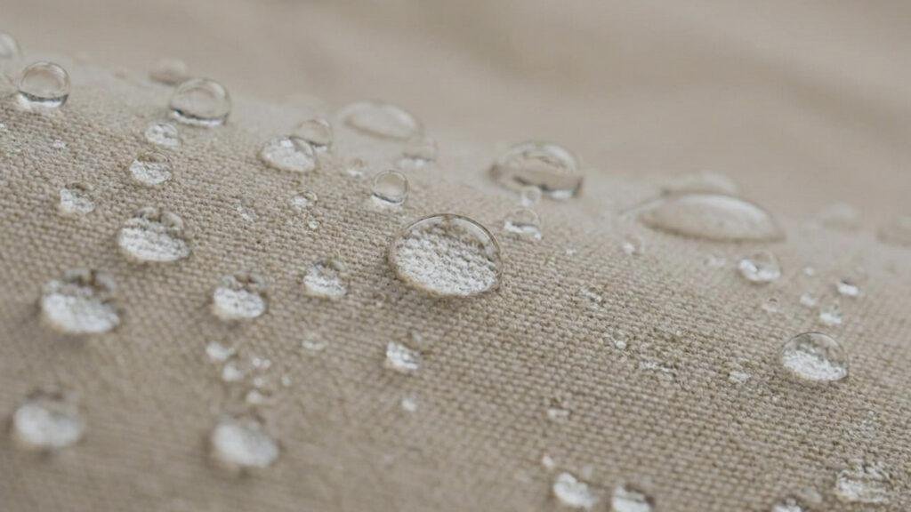Rainwater beading on the seasoned cotton canvas of the Teton Mesa tent.