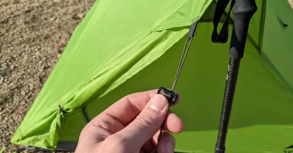 Adjusting the guy line tension on a 3F UL Gear Lanshan 2 tent.