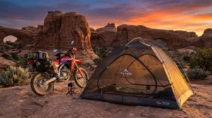 TETON Sports Mountain Ultra 2 tent pitched on a red-rock plateau in Moab, Utah, at sunset