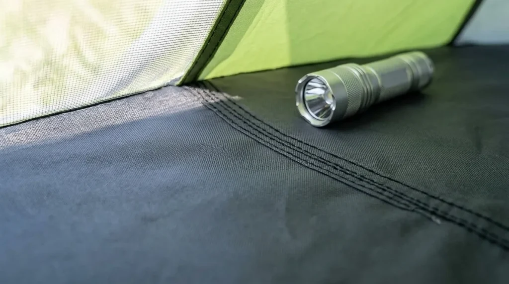 A detailed close up of the thick 210D Oxford waterproof floor and reinforced seams on an Ayamaya tent.
