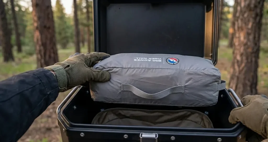 A Big Agnes Tiger Wall UL2 Bikepack tent fitting perfectly inside a motorcycle pannier.