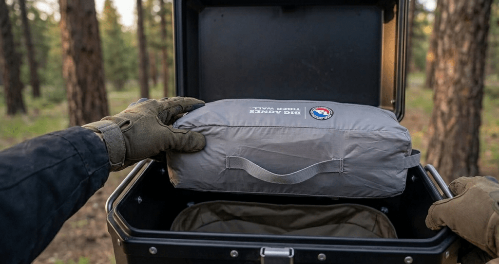 A Big Agnes Tiger Wall UL2 Bikepack tent fitting perfectly inside a motorcycle pannier.