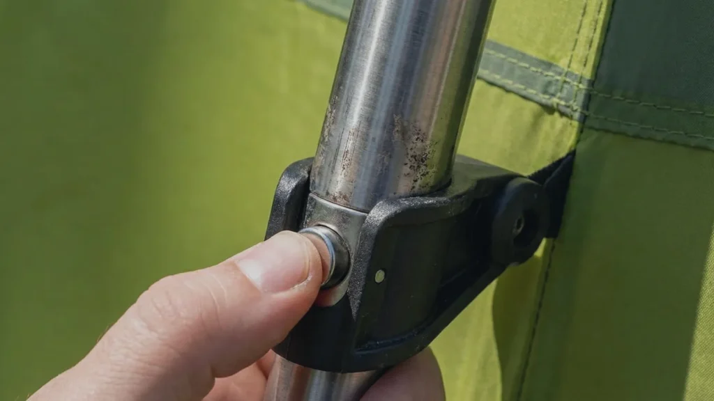 Close up of the steel telescoping pole and click-button mechanism on the Core 9 person instant cabin tent.