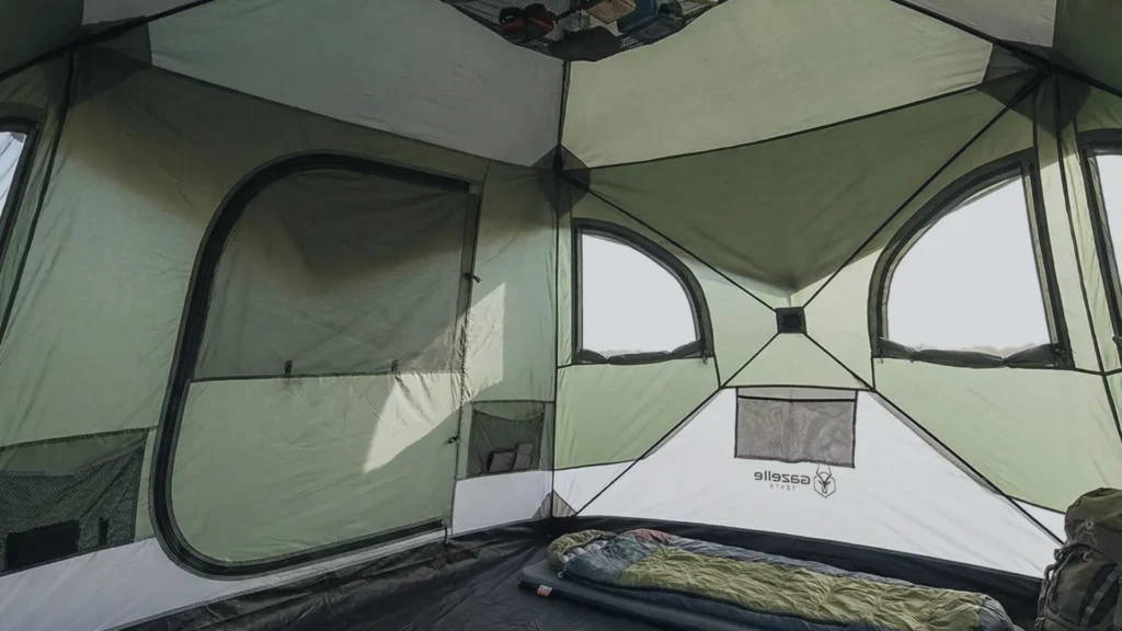 Interior of Gazelle T4 hub tent showing standing height and vertical walls.