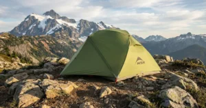 MSR Elixir 2 tent pitched on a rocky mountain overlook.