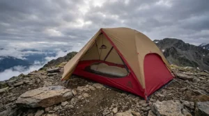 An MSR Freelite 2 ultralight tent pitched in the mountains during cloudy weather.