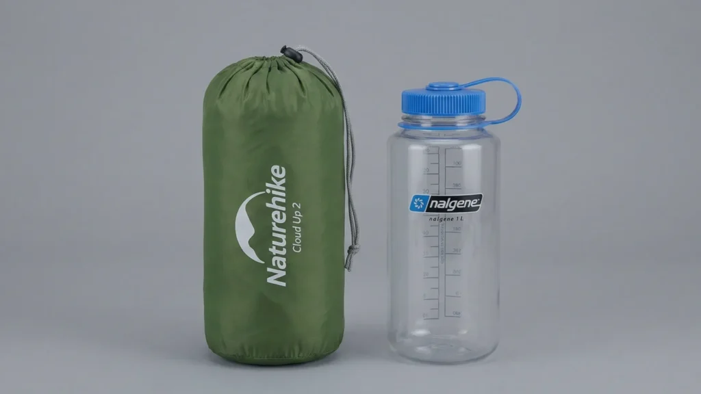 Packed Naturehike Cloud Up 2 tent compared to a 1L Nalgene bottle.