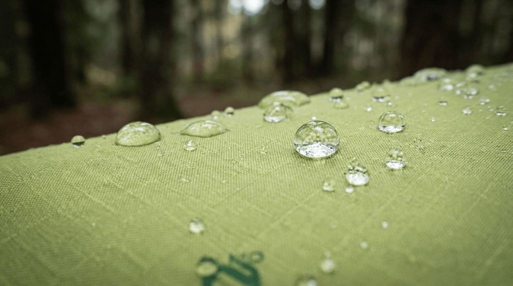 Close up of water beading on the waterproof OSMO fabric of a Nemo Hornet OSMO 2P tent.