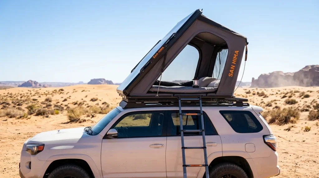 Measuring the peak height of a hard shell wedge style San Hima rooftop tent.