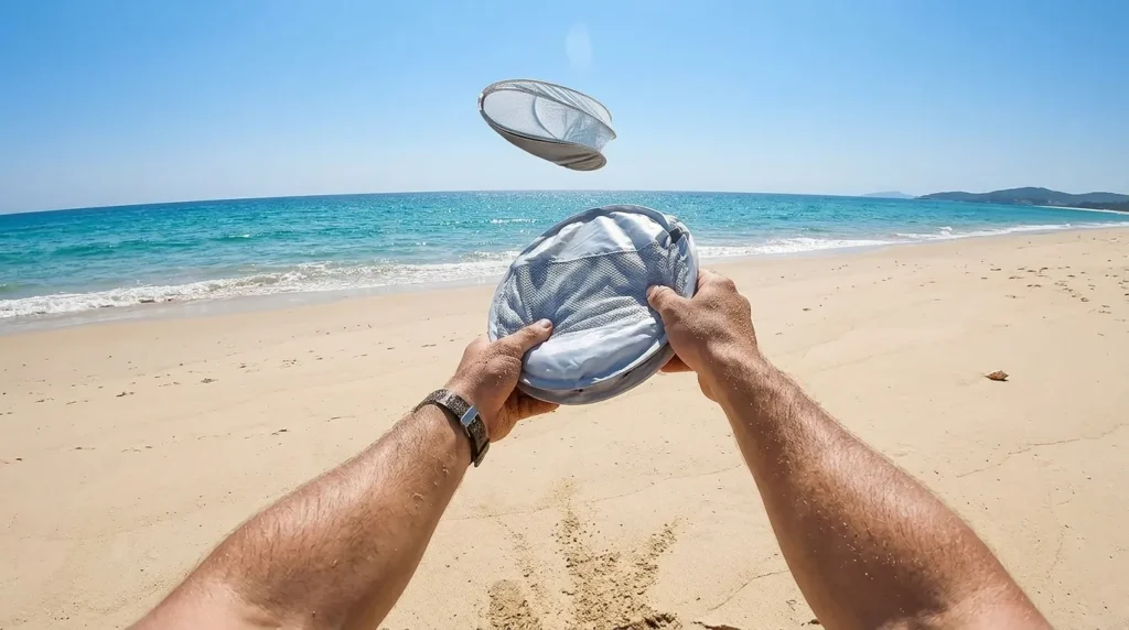The 1-second pop up mechanism of an Elegear beach tent being released.