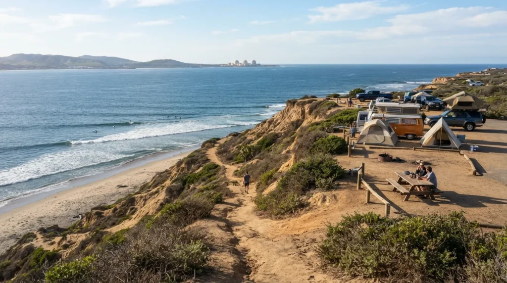 Beach tent camping Southern California: Trail leading down sandstone bluffs to a Southern California beach