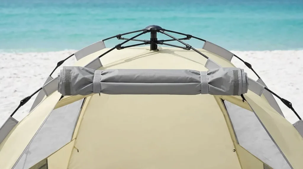 Front floor extension folded up over the poles on a beach tent for added security