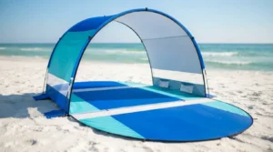 Rhino Valley beach tent set up on white sand with both zippered doors open
