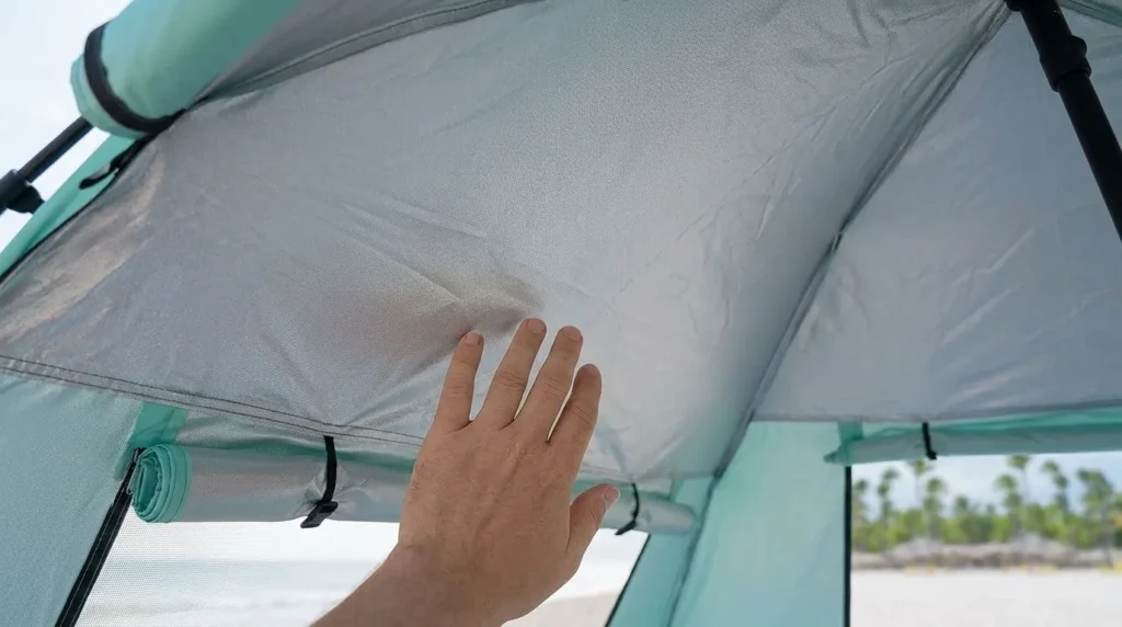 Silver-coated UPF 50+ fabric inside a TOBTOS pop up beach tent