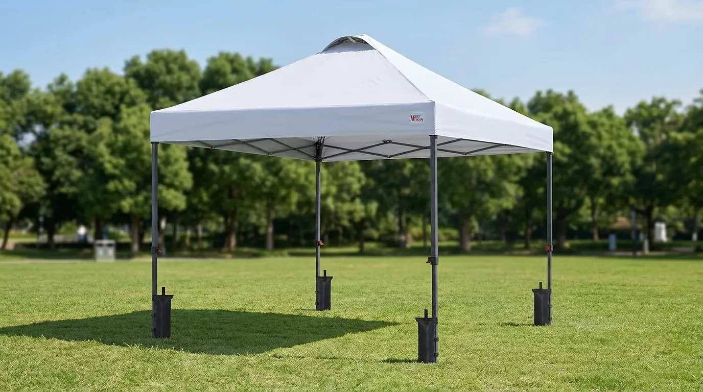 MASTERCANOPY 10x10 pop up canopy with a vented top and a red and white roller bag on a lawn