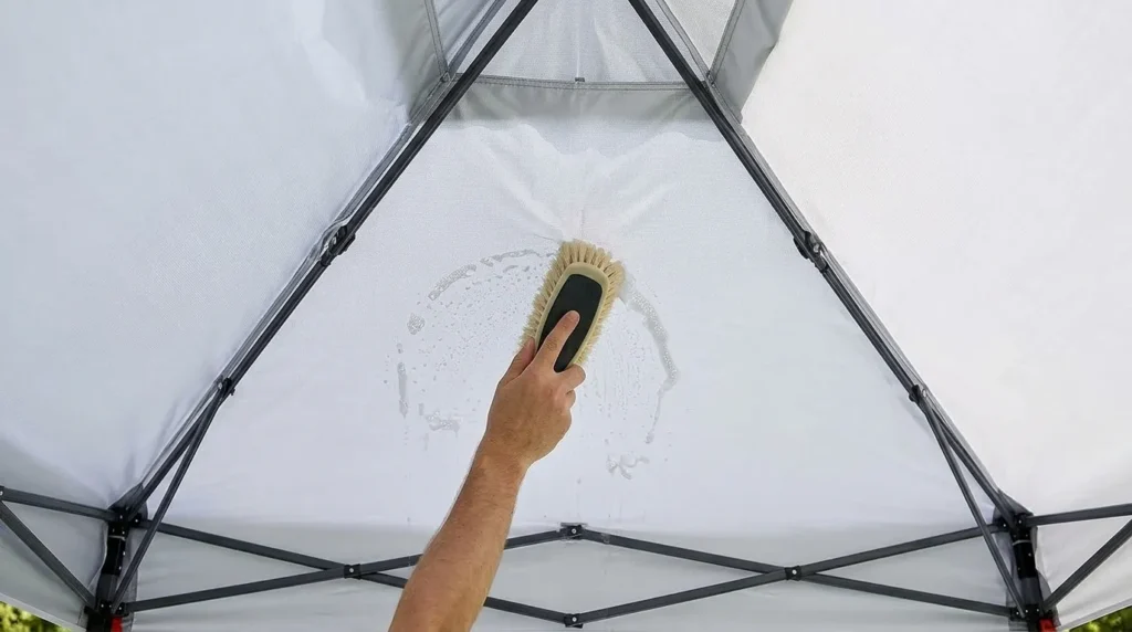 How to clean a canopy tent: Washing the underside of a MASTERCANOPY pop up canopy tent with a soft brush